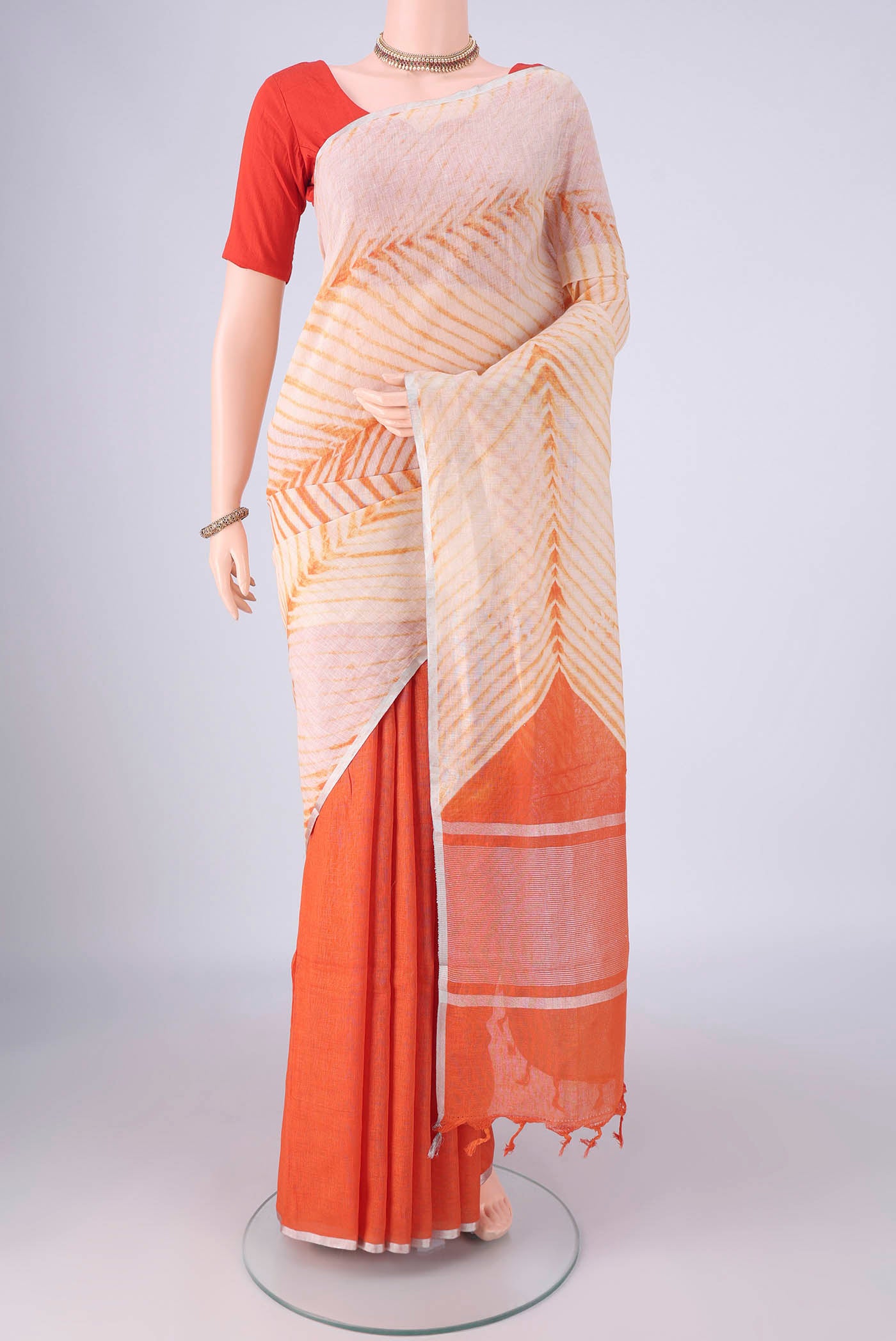 Multi Color Linen Saree with Half And Half on the body and Thin Zari Line.  displayed on a mannequin