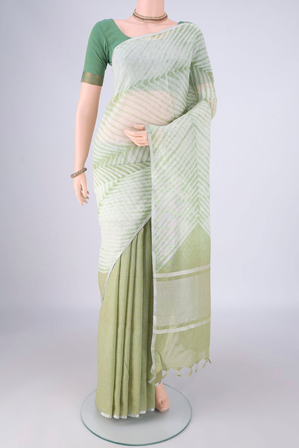 Multi Color Linen Saree with Half And Half on the body and Thin Zari Line.  displayed on a mannequin