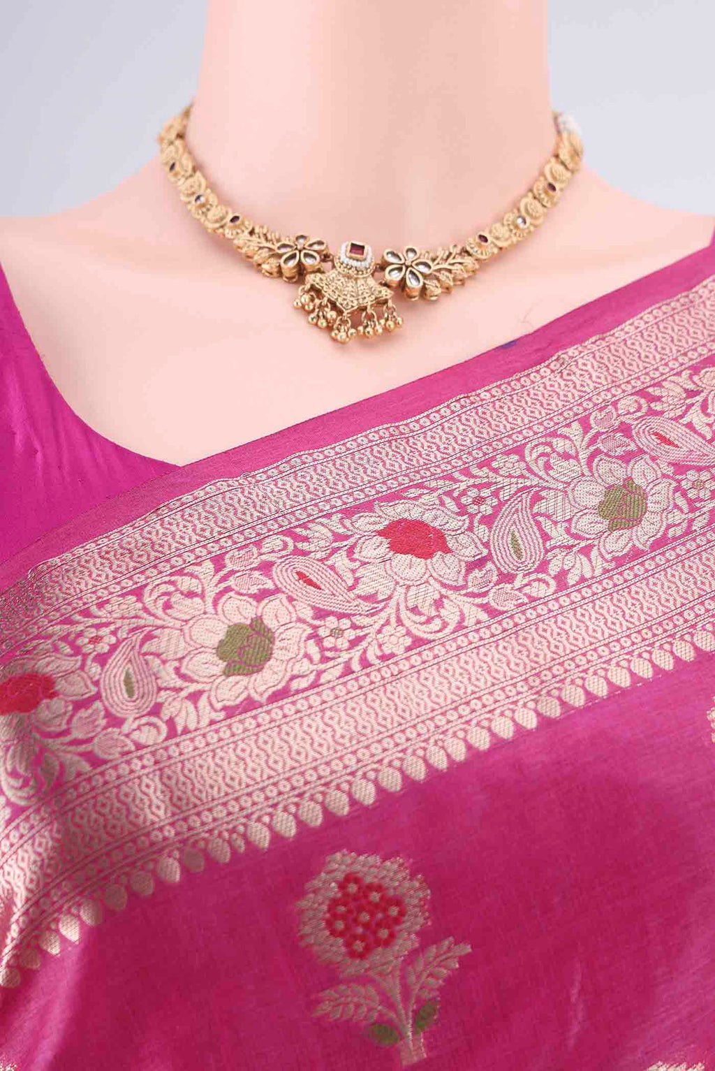 Border image of Rani Pink Banarasi Tussar Saree with Zari And Thread Butta on the body and Zari And Thread Border. 