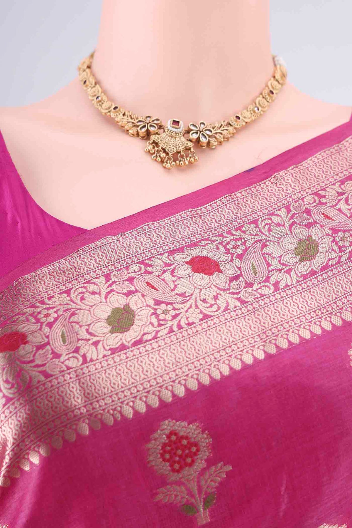 Border image of Rani Pink Banarasi Tussar Saree with Zari And Thread Butta on the body and Zari And Thread Border. 