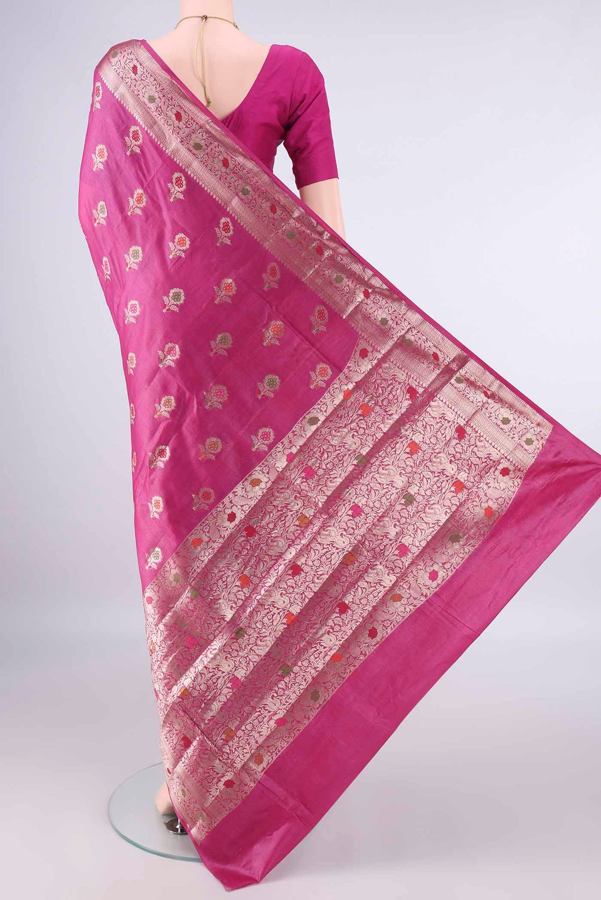 Flat view of Rani Pink Banarasi Tussar Saree with Zari And Thread Butta on the body and Zari And Thread Border. 