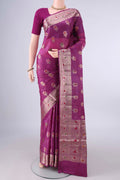Magenta Banarasi Tussar Saree with Zari And Thread Butta on the body and Zari And Thread Border.  displayed on a mannequin