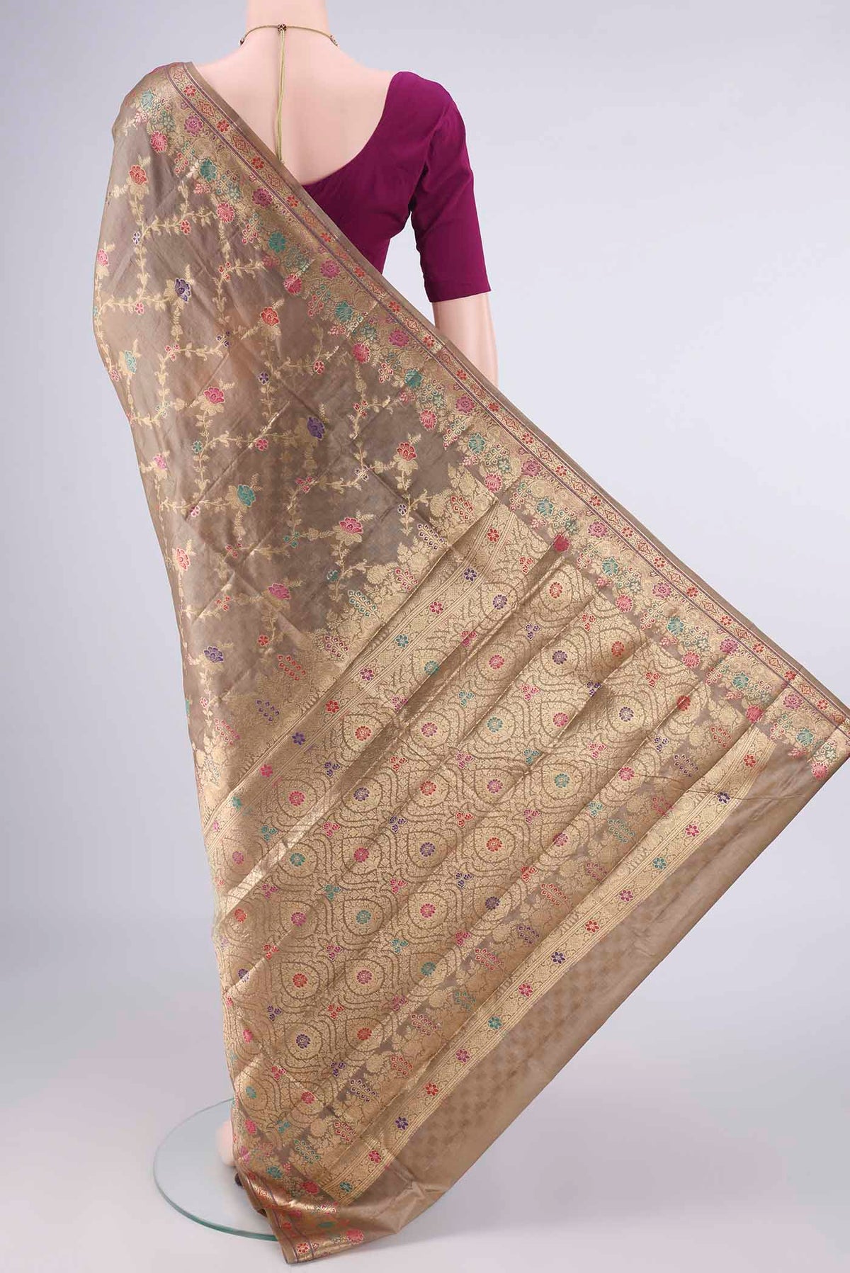 Flat view of Dark Beige Banarasi Tussar Saree with Zari Brocade on the body and Zari And Thread Border. 