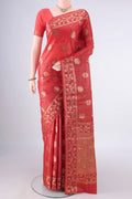 Red Banarasi Tussar Saree with Zari And Thread Butta on the body and Zari And Thread Border.  displayed on a mannequin