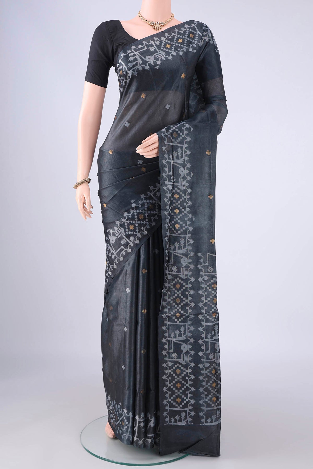 Davys Grey Banarasi Tussar Silk Saree with Zari And Thread Butta on the body and Zari And Thread Border.  displayed on a mannequin