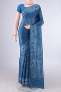 Maya Blue Banarasi Tussar Saree with Zari And Thread Butta on the body and Thread Border.  displayed on a mannequin