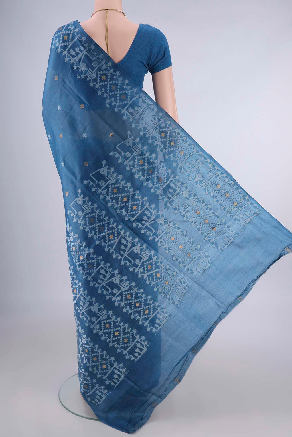 Flat view of Maya Blue Banarasi Tussar Saree with Zari And Thread Butta on the body and Thread Border. 