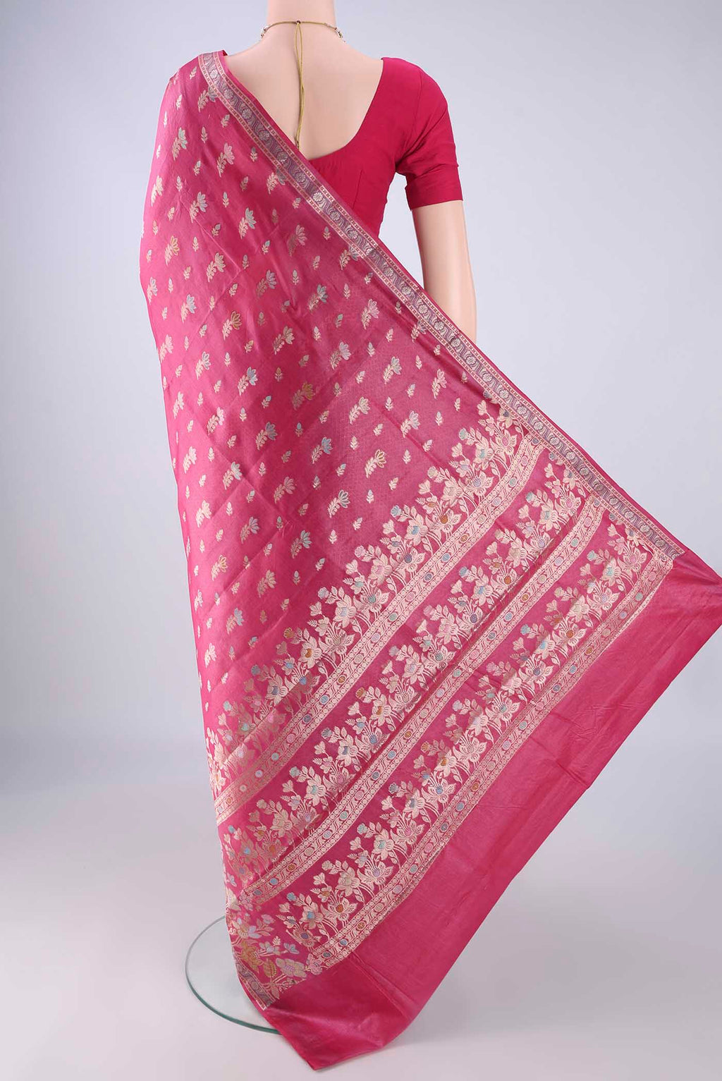 Flat view of Pink Banarasi Tussar Silk Saree with Zari And Thread Butta on the body and Zari Border. 