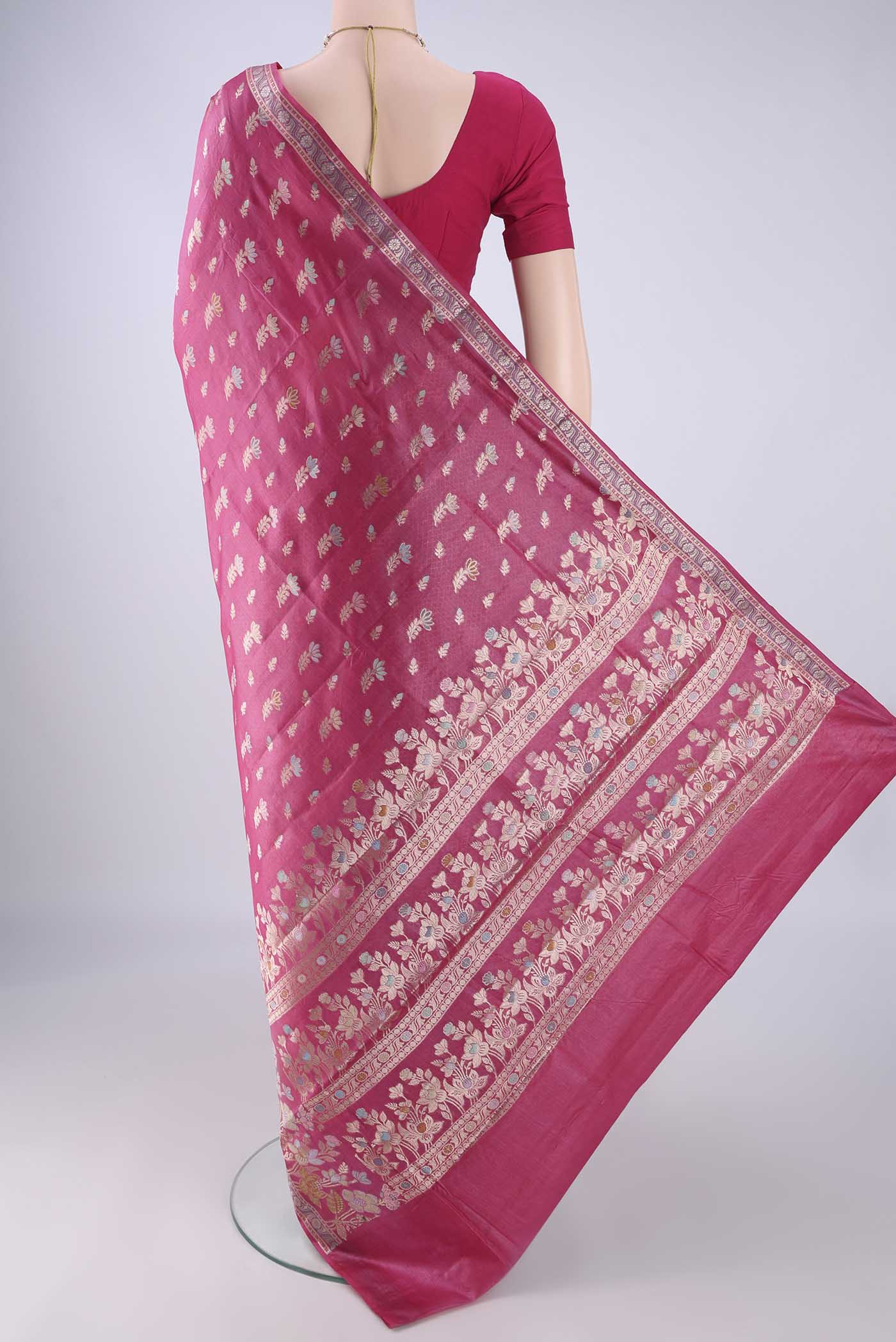 Flat view of Pink Banarasi Tussar Silk Saree with Zari And Thread Butta on the body and Zari Border. 