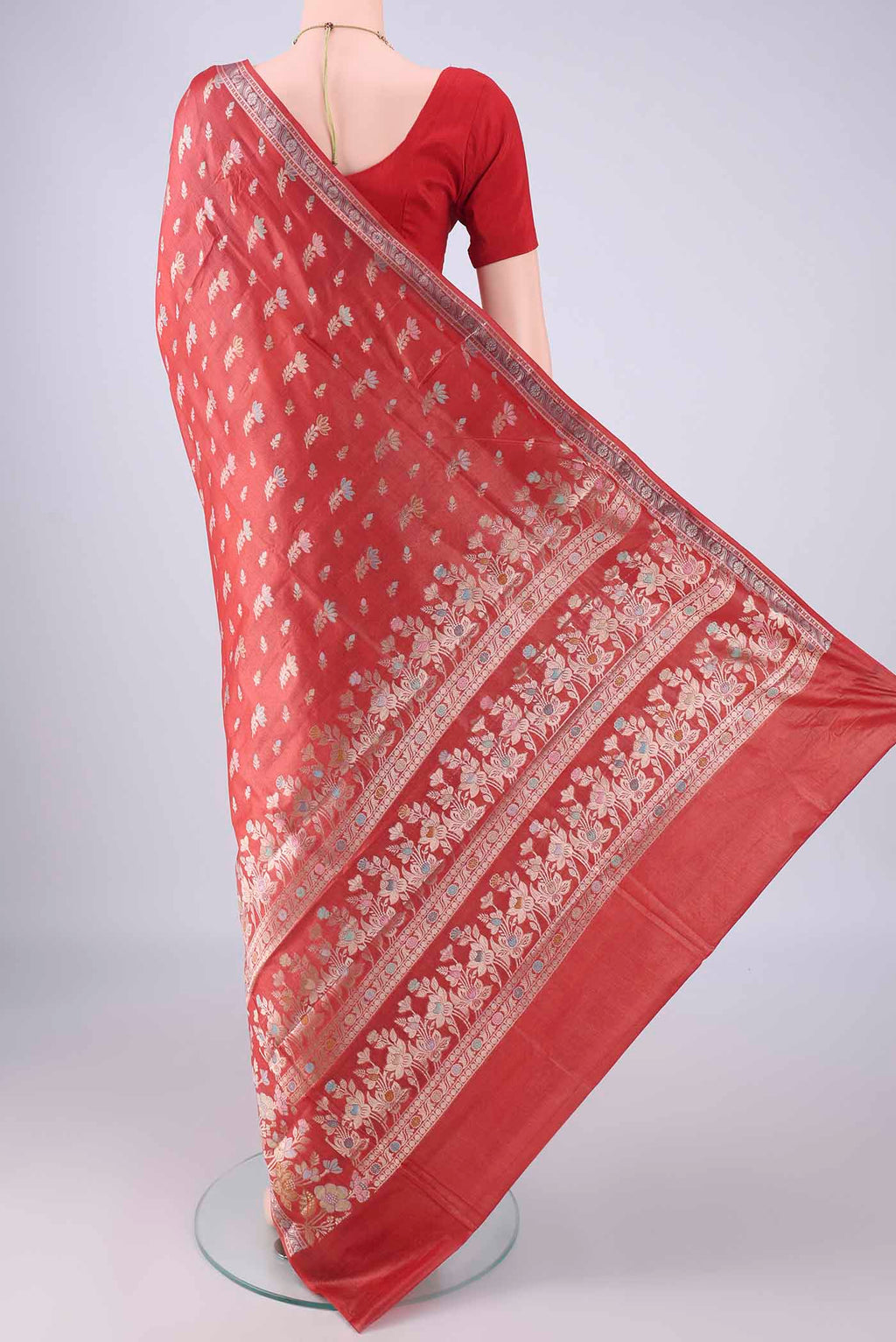 Flat view of Rust Banarasi Tussar Silk Saree with Zari And Thread Butta on the body and Zari Border. 
