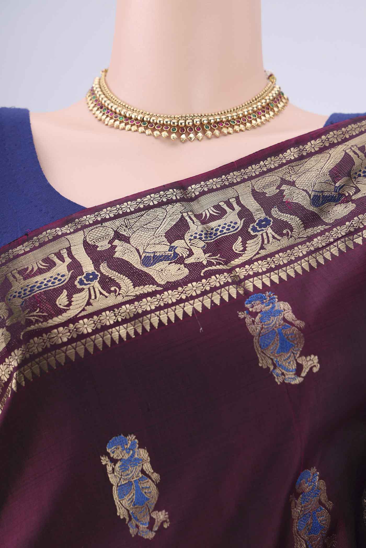 Border image of Burgundy Baluchari Silk Saree with Zari And Thread Butta on the body and Zari And Thread Border. 