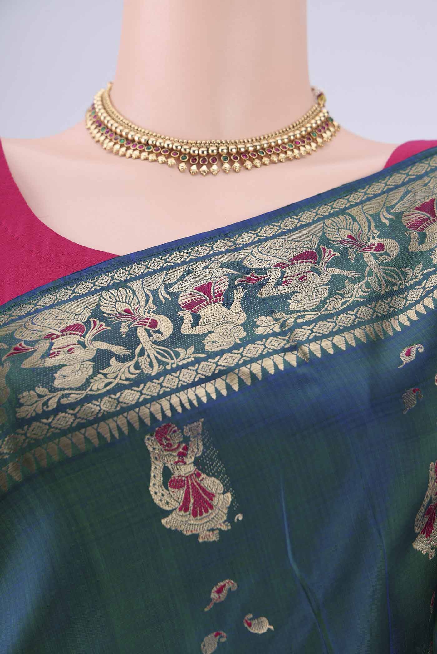 Border image of Peacock Blue Dual Tone Baluchari Silk Saree with Zari And Thread Butta on the body and Zari And Thread Border. 