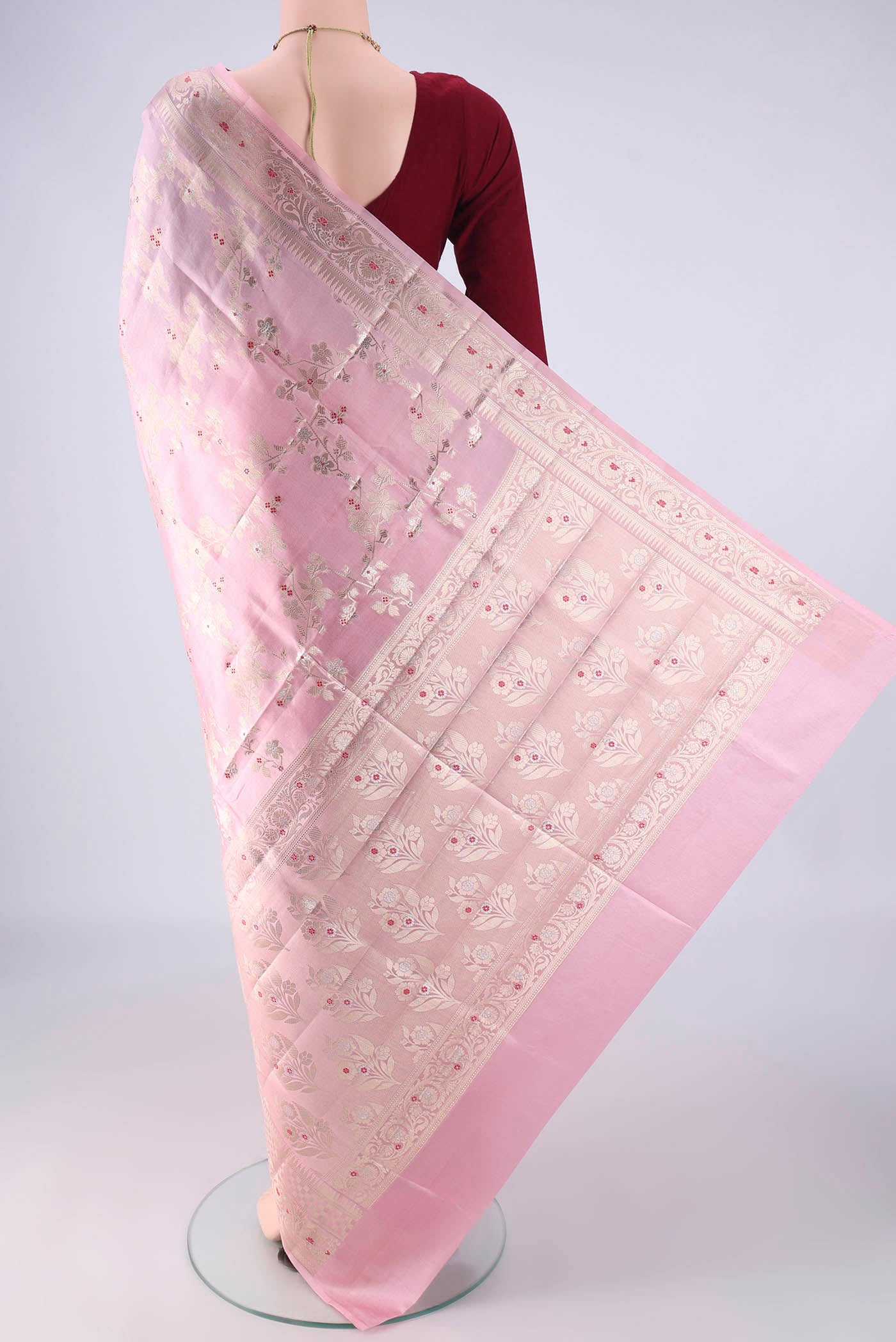 Flat view of Rose pink Banarasi Raw Silk Saree with Zari And Thread Butta on the body and Zari And Thread Border. 