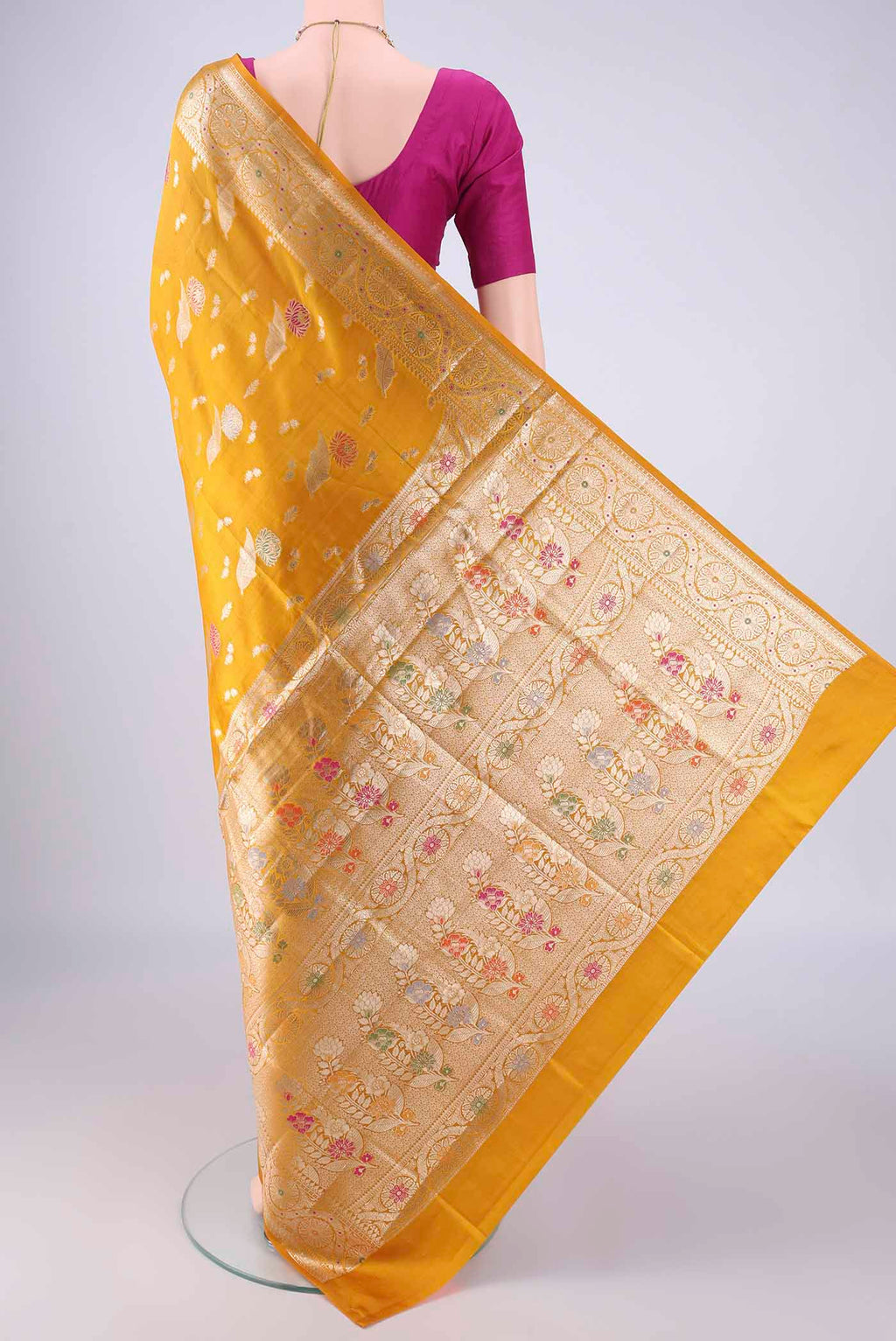 Flat view of Mustard Banarasi Raw Silk Saree with Zari And Thread Butta on the body and Zari Border. 