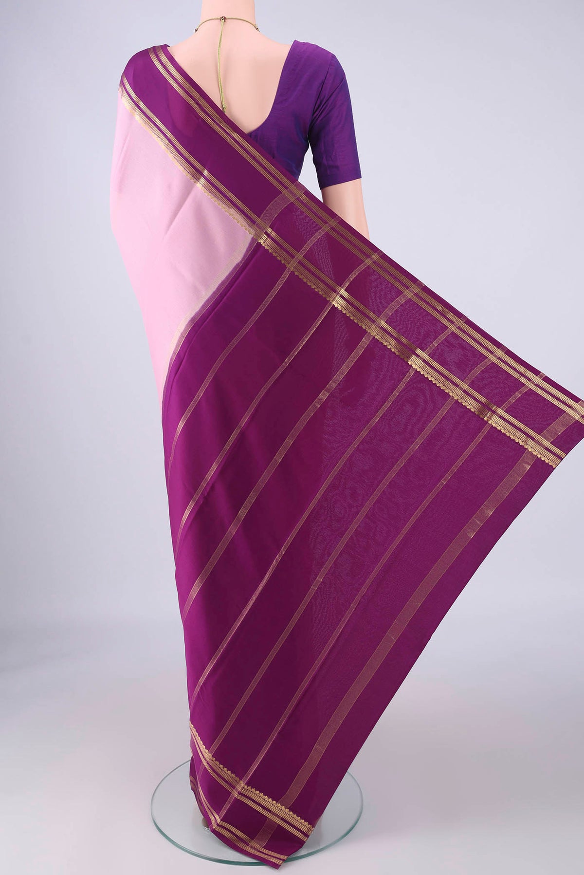 Flat view of Rose pink Mysore Crepe Saree with Plain Body and Zari Border. 