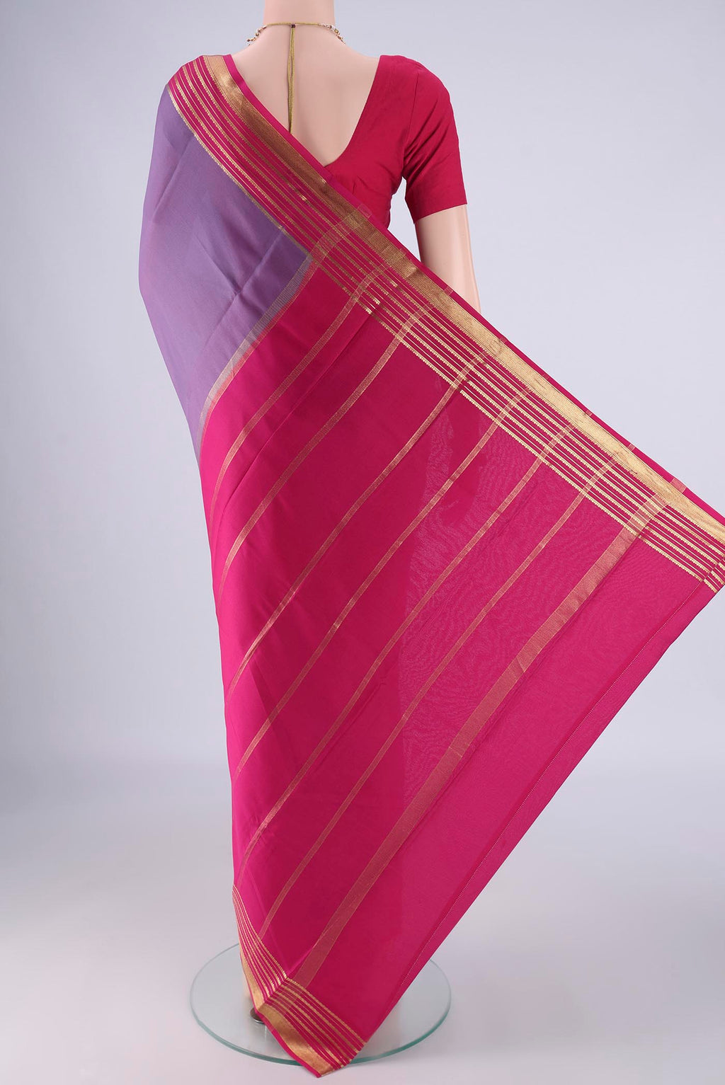 Flat view of Lavender Mysore Crepe Saree with Plain Body and Zari Border. 