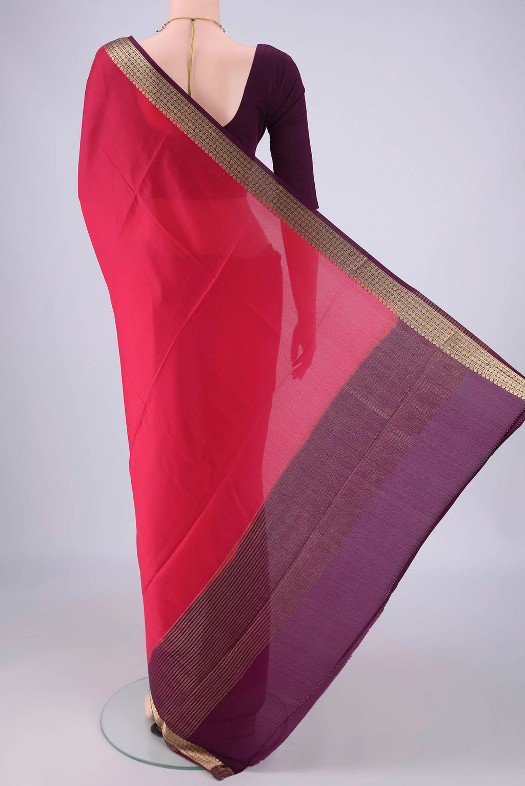 Flat view of Pink Mysore Crepe Saree with Plain Body and Zari Border. 