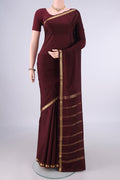 Coffee Brown Mysore Crepe Saree with Plain Body and Zari Border.  displayed on a mannequin
