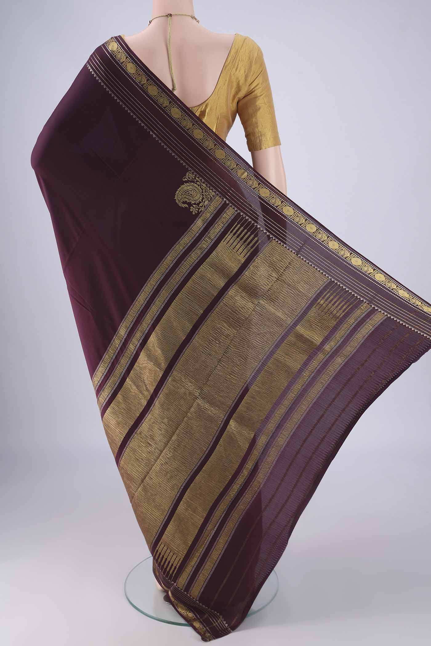 Flat view of Coffee Brown Mysore Crepe Saree with Plain Body and Zari Border. 