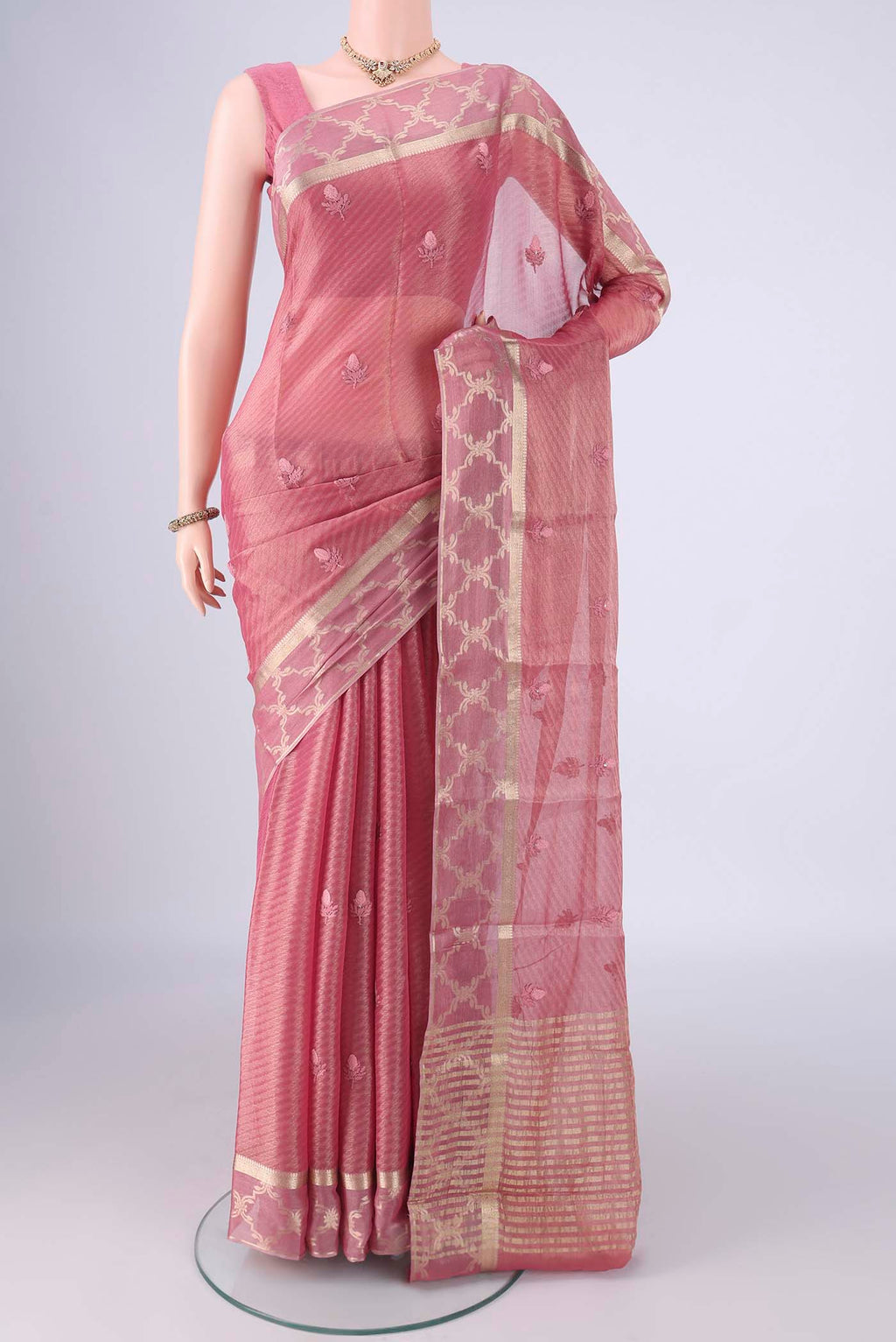 Pink Mysore Georgette Saree with Embroidery on the body and Zari Border.  displayed on a mannequin