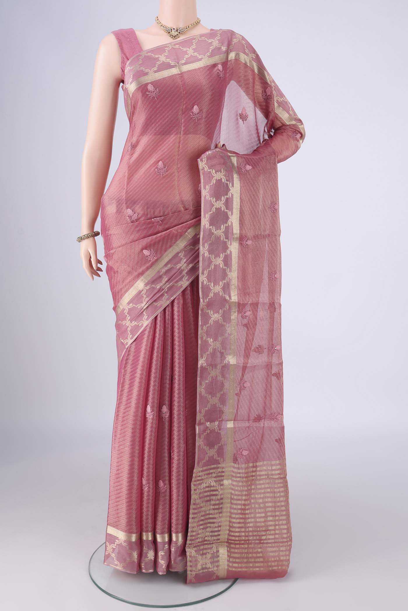 Pink Mysore Georgette Saree with Embroidery on the body and Zari Border.  displayed on a mannequin