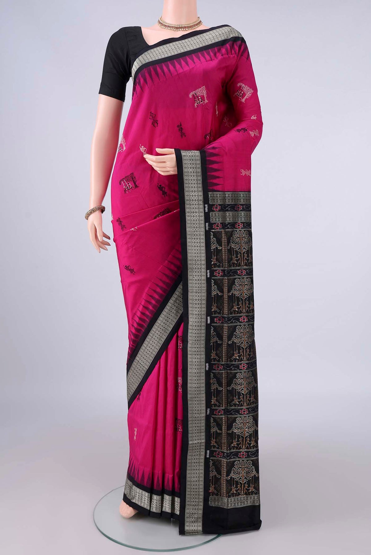 Pure Silk Rani Pink Orissa Saree with Thread Butta on the body and Thread Border.  displayed on a mannequin