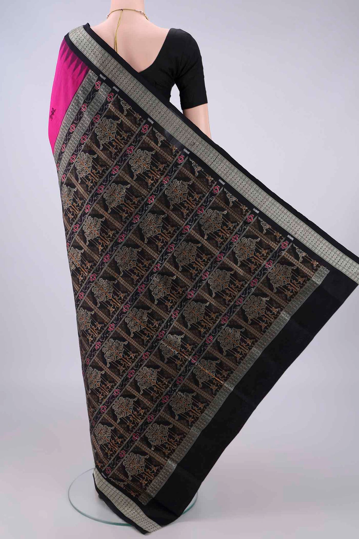 Flat view of Pure Silk Rani Pink Orissa Saree with Thread Butta on the body and Thread Border. 