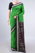 Pure Silk Green Orissa Saree with Thread Butta on the body and Thread Border.  displayed on a mannequin