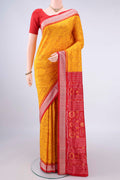 Pure Silk Yellow Orissa Saree with Pure Ikat on the body and Thread Border.  displayed on a mannequin