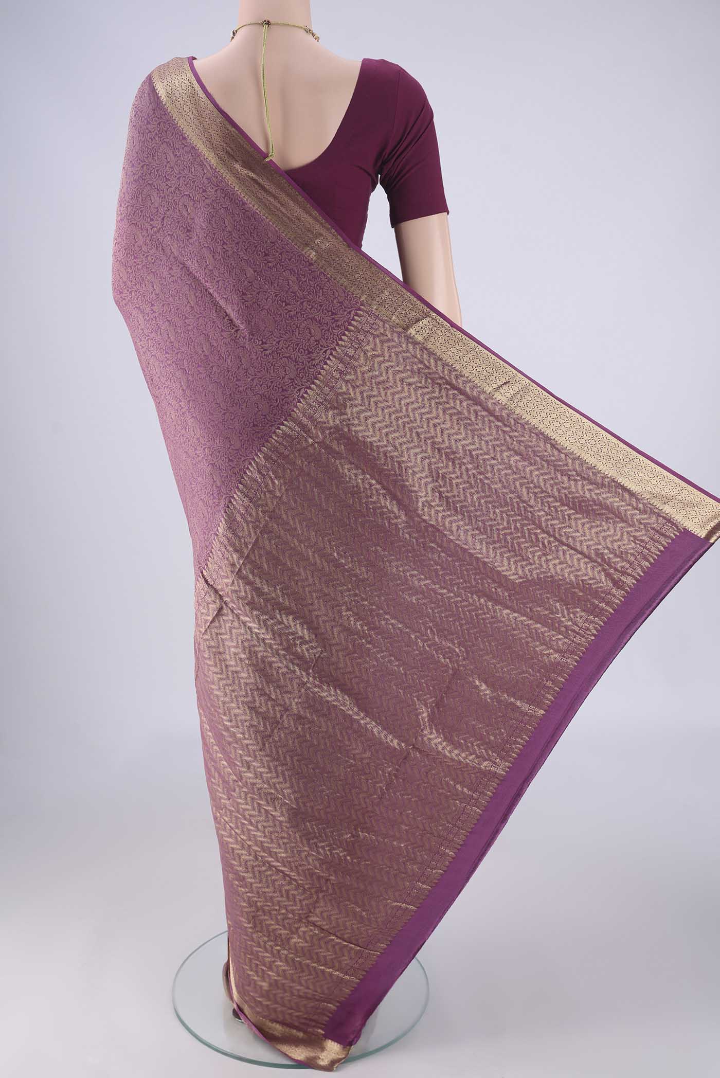 Flat view of Purple Mysore Crepe Saree with Zari Brocade on the body and Zari Border. 