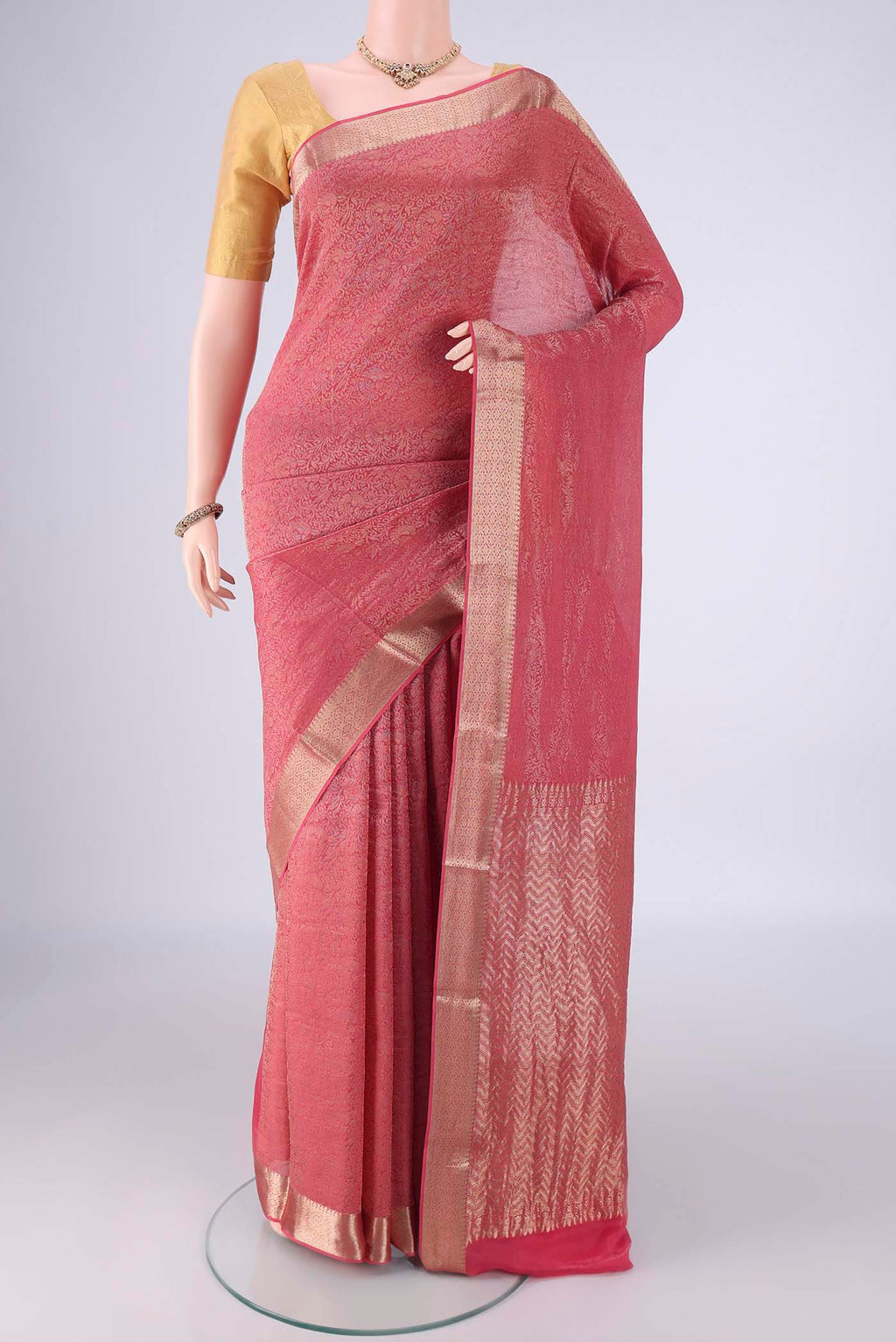 Pink Mysore Crepe Saree with Zari Brocade on the body and Zari Border.  displayed on a mannequin