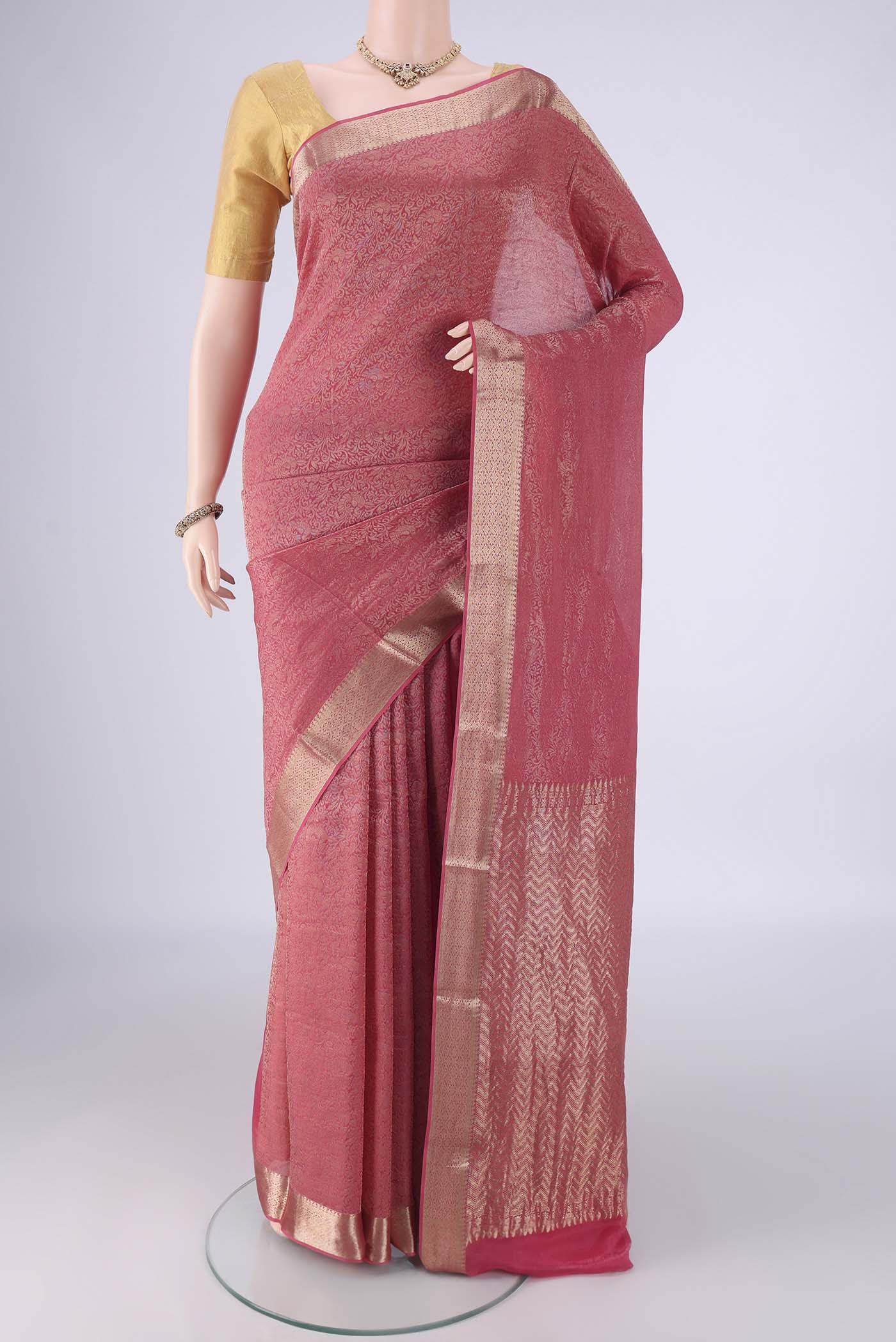 Pink Mysore Crepe Saree with Zari Brocade on the body and Zari Border.  displayed on a mannequin