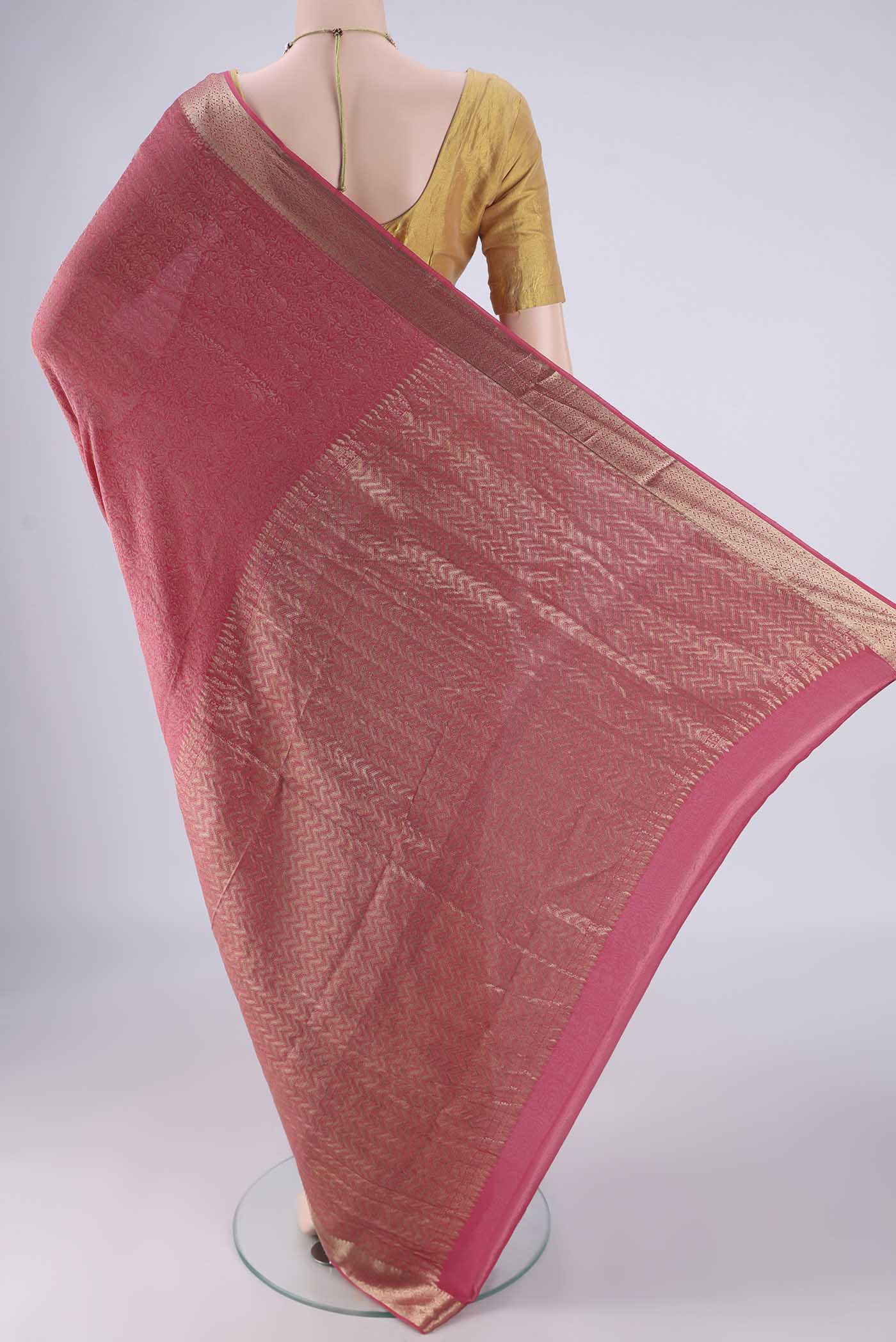 Flat view of Pink Mysore Crepe Saree with Zari Brocade on the body and Zari Border. 
