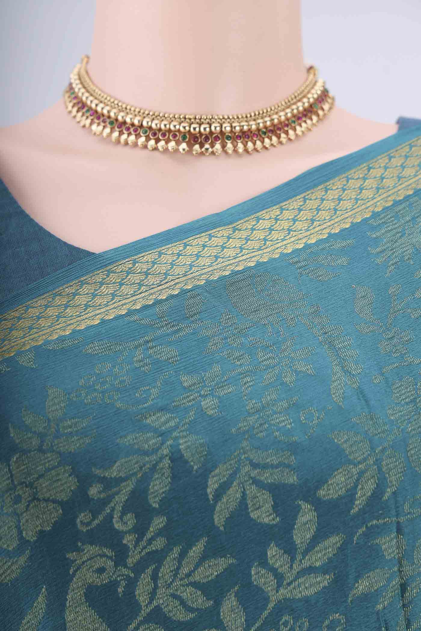 Border image of Teal Mysore Georgette Saree with Zari Brocade on the body and Zari Border. 