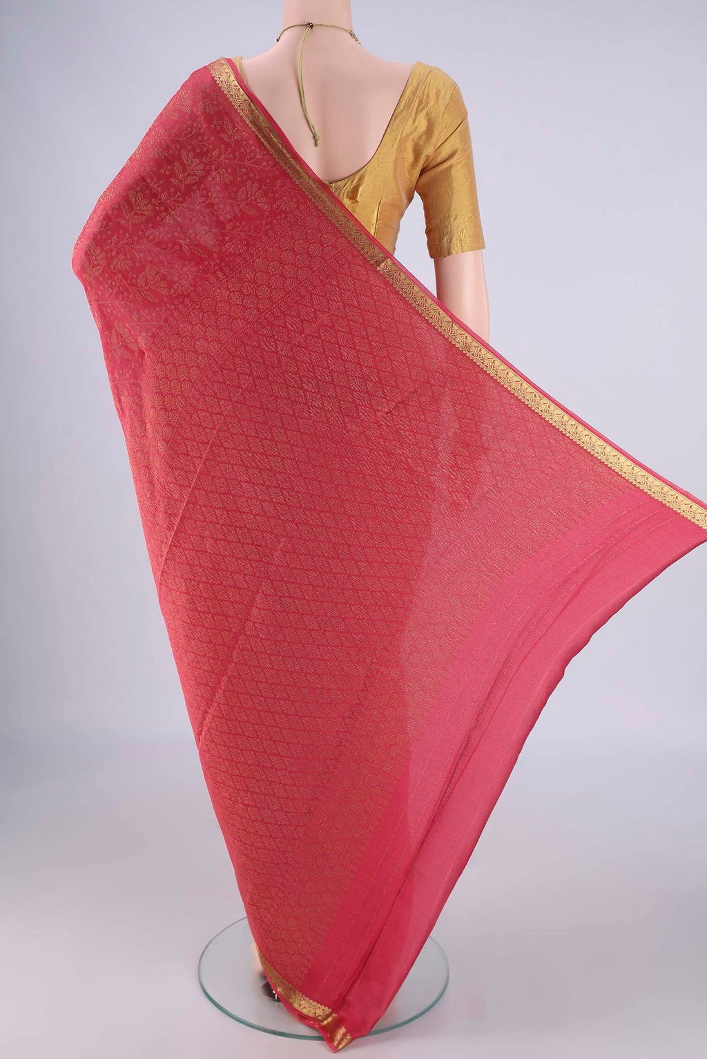 Flat view of Coral Mysore Crepe Saree with Zari Brocade on the body and Zari Border. 