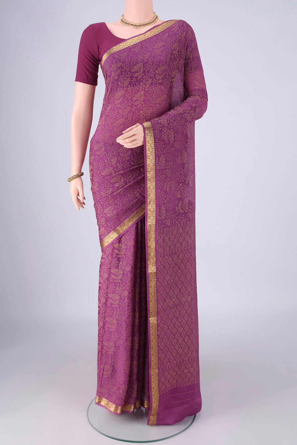 Purple Mysore Crepe Saree with Zari Brocade on the body and Zari Border.  displayed on a mannequin