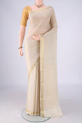 Off White Mysore Crepe Saree with Zari Brocade on the body and Zari Border.  displayed on a mannequin