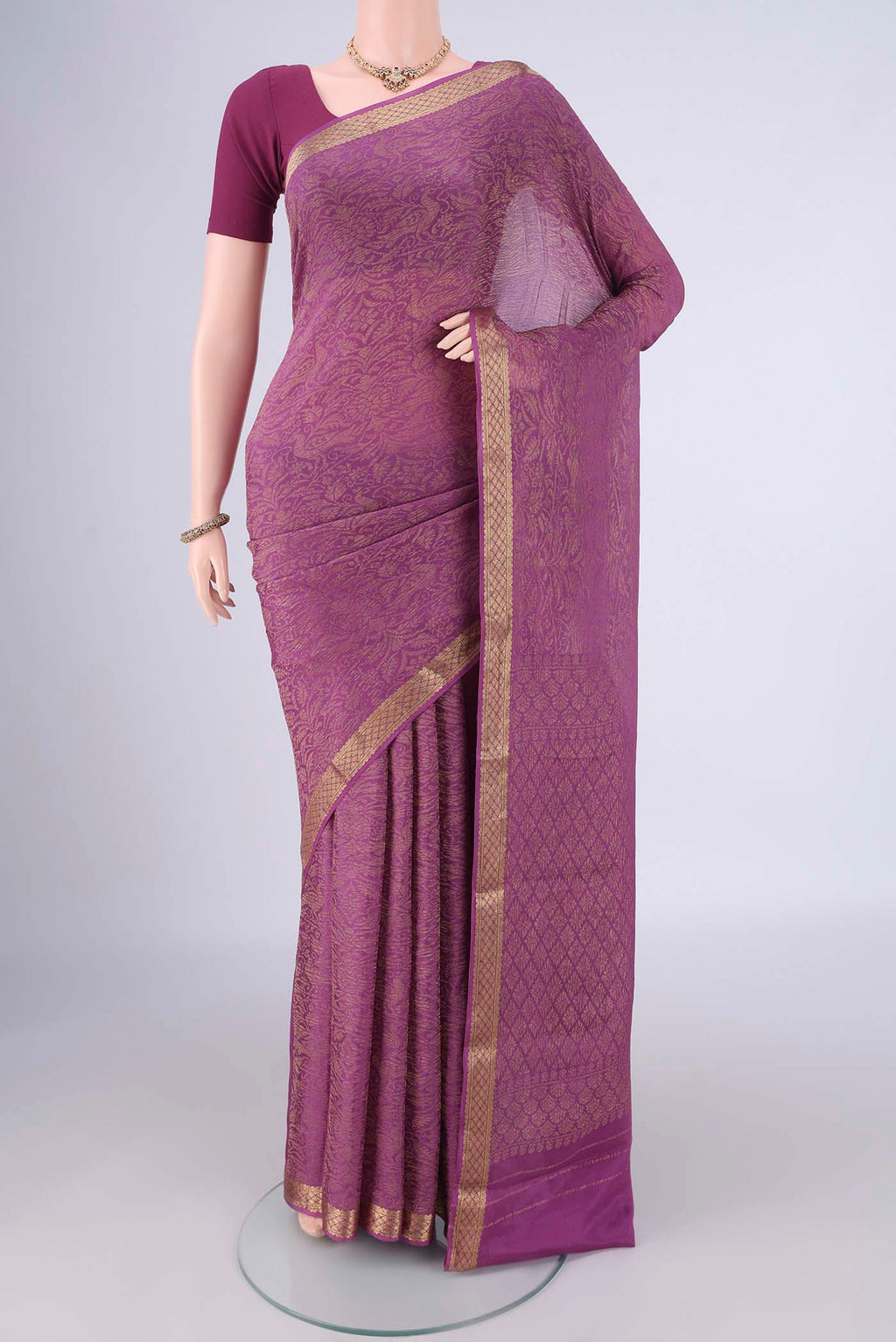 Purple Mysore Crepe Saree with Zari Brocade on the body and Zari Border.  displayed on a mannequin