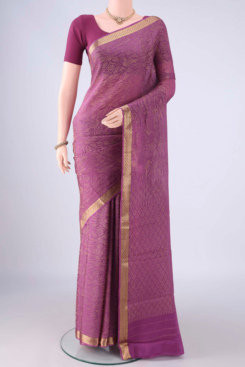 Purple Mysore Crepe Saree with Zari Brocade on the body and Zari Border.  displayed on a mannequin