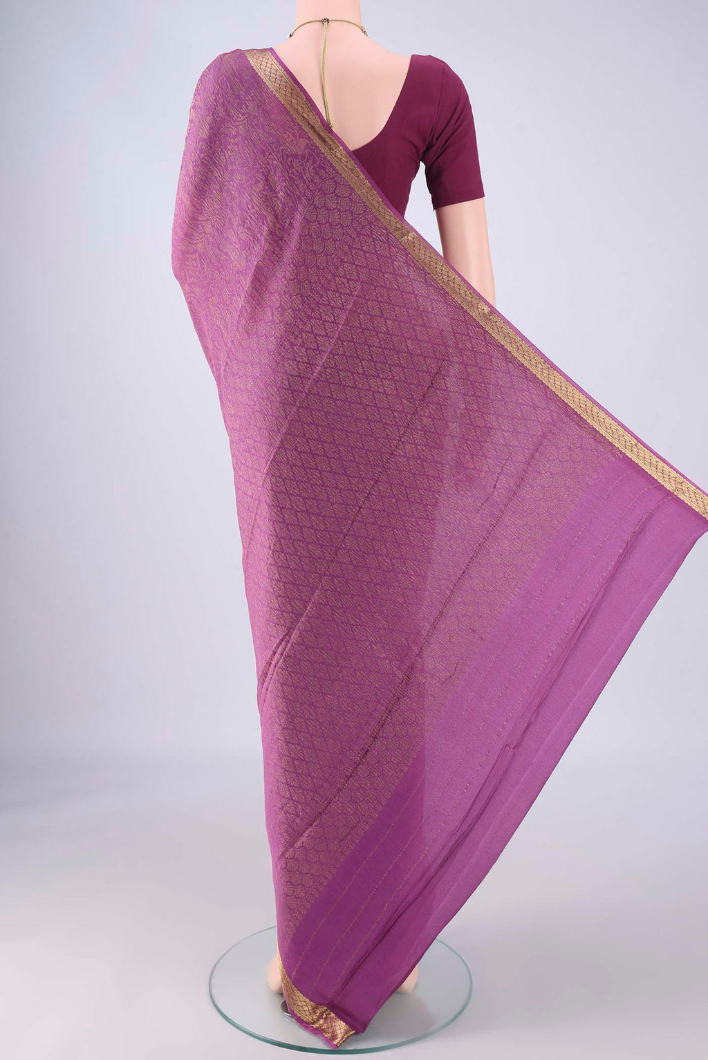 Flat view of Purple Mysore Crepe Saree with Zari Brocade on the body and Zari Border. 