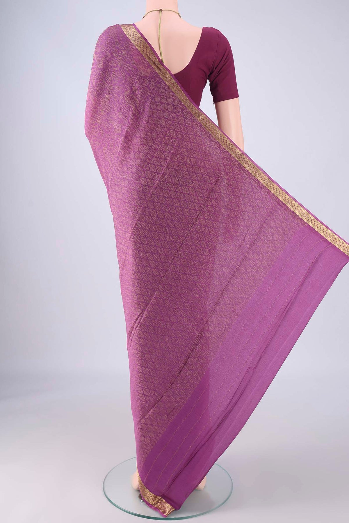 Flat view of Purple Mysore Crepe Saree with Zari Brocade on the body and Zari Border. 