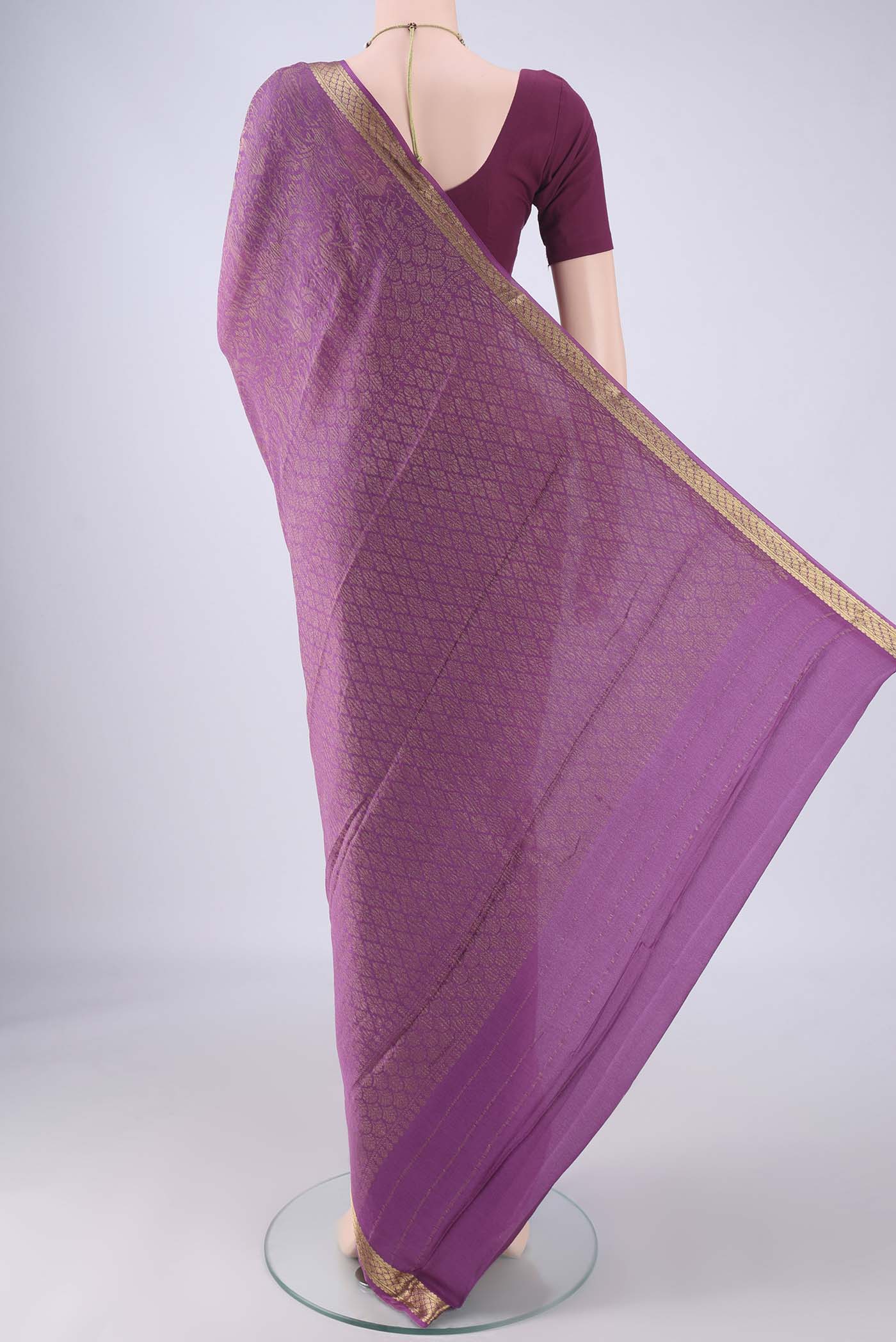 Flat view of Purple Mysore Crepe Saree with Zari Brocade on the body and Zari Border. 