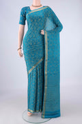 Blue Mysore Crepe Saree with Zari Brocade on the body and Zari Border.  displayed on a mannequin