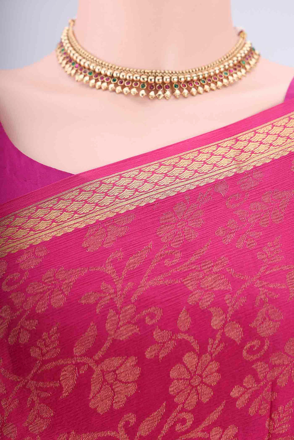 Border image of Rani Pink Mysore Georgette Saree with Zari Brocade on the body and Zari Border. 