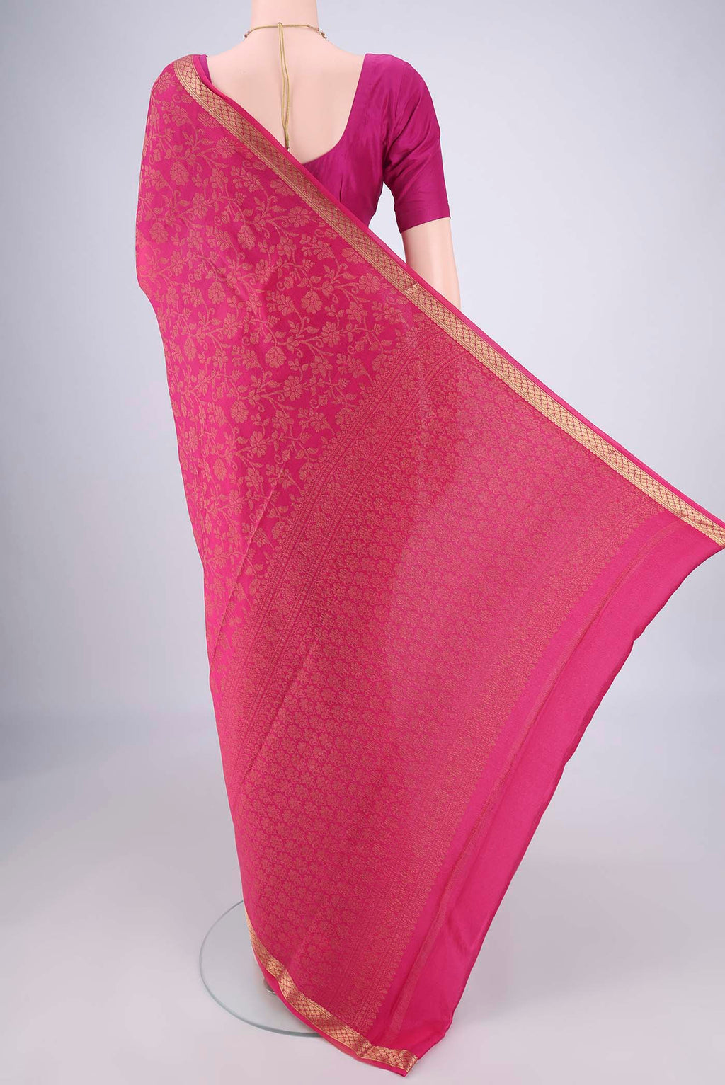 Flat view of Rani Pink Mysore Georgette Saree with Zari Brocade on the body and Zari Border. 