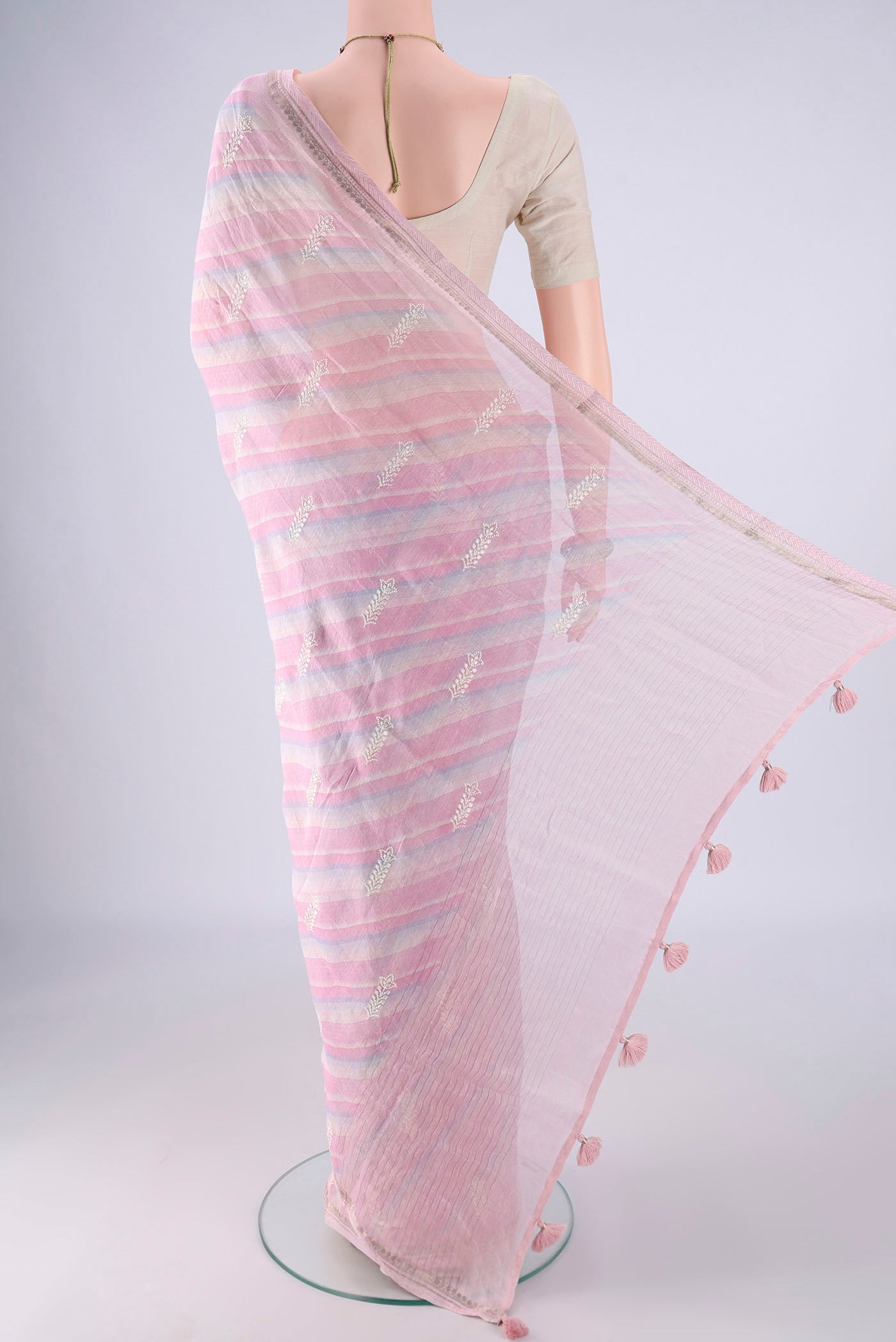 Flat view of Multi Color Linen Saree with Lehariya on the body and Zari Border. 