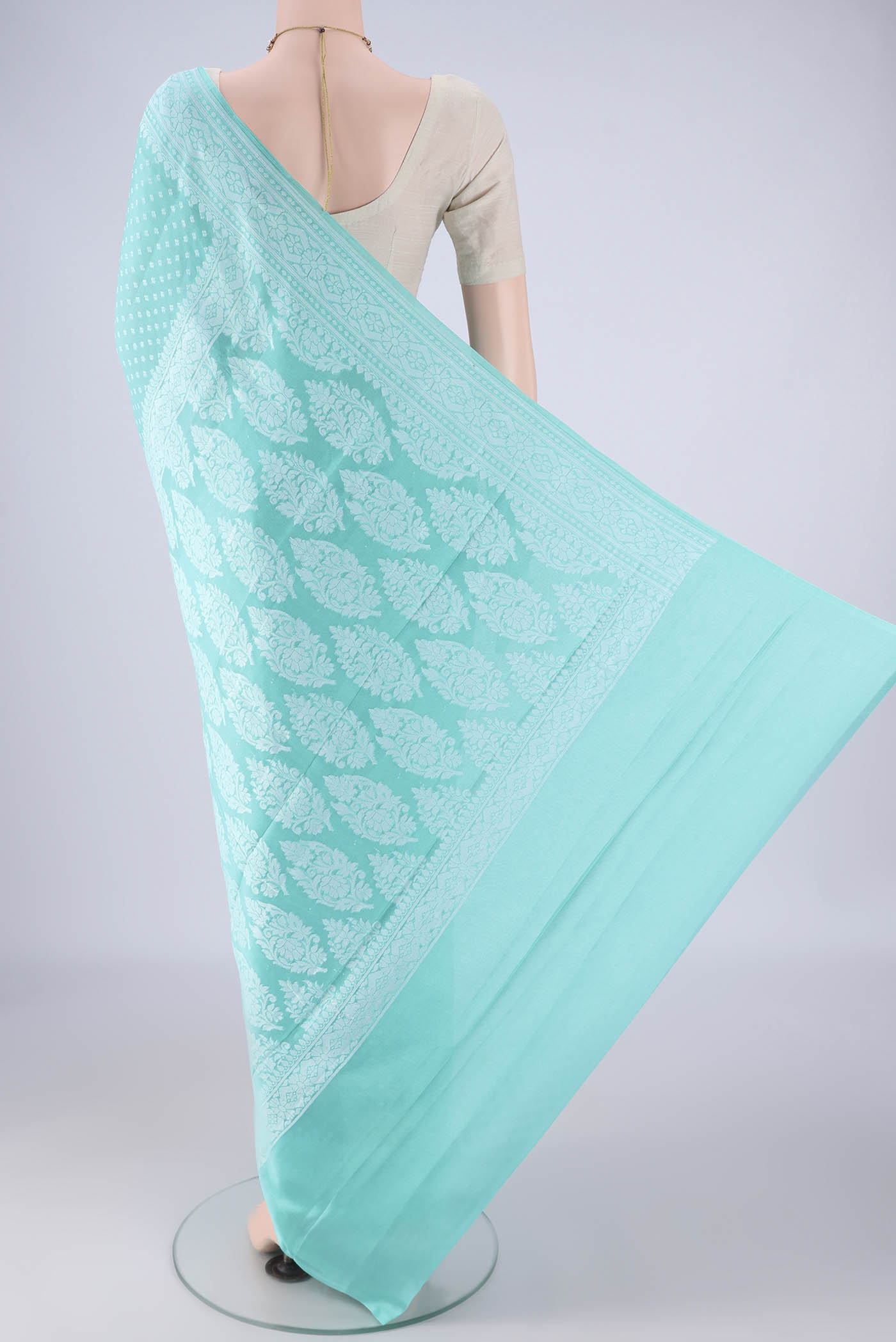 Flat view of Sky Blue Blended Banarasi Georgette Saree with Thread Butta on the body and Thread Border. 