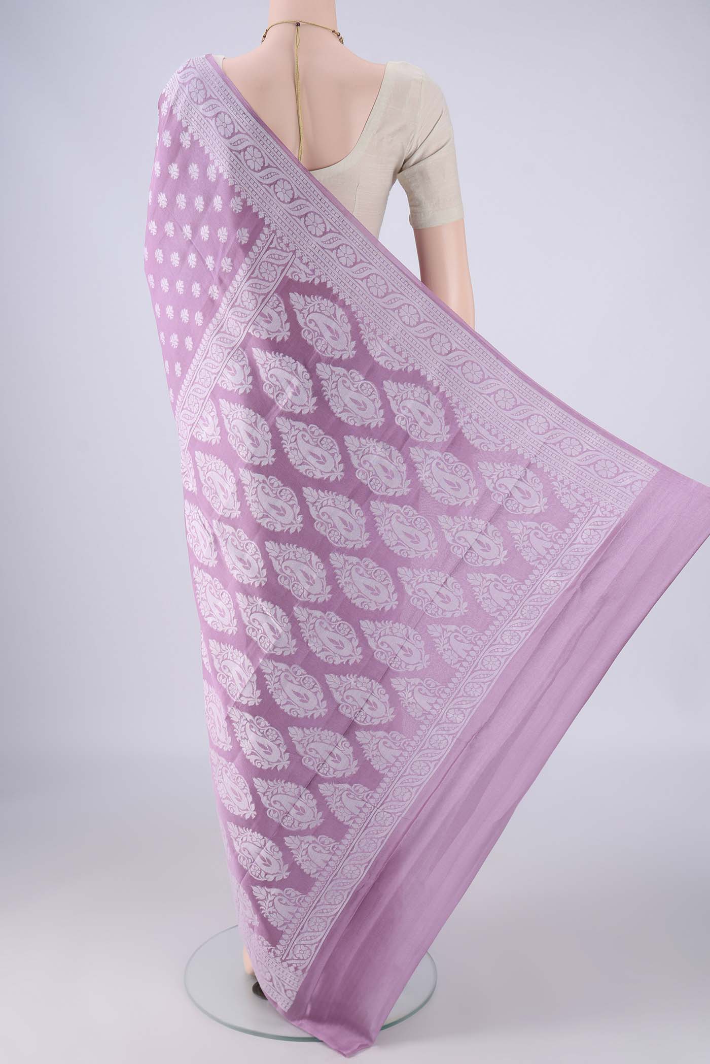 Flat view of Lavender Blended Banarasi Georgette Saree with Thread Butta on the body and Thread Border. 