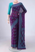 Purple Blended Banarasi Georgette Saree with Thread Brocade on the body and Thread Border.  displayed on a mannequin
