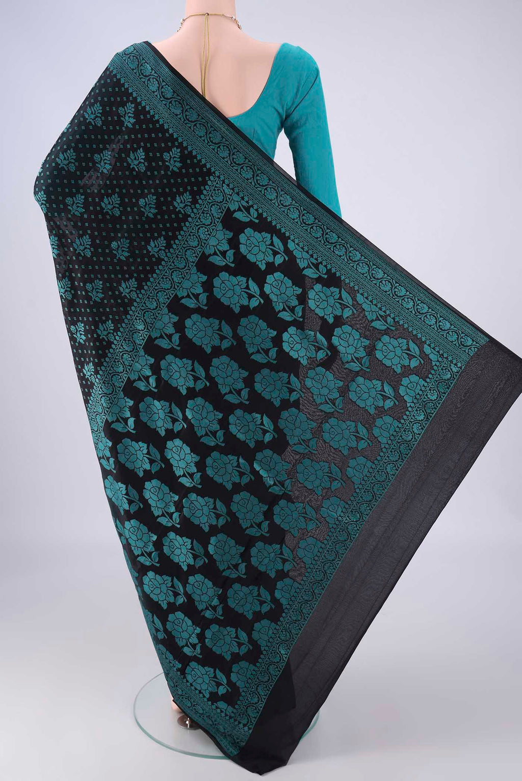 Flat view of Black Blended Banarasi Georgette Saree with Thread Brocade on the body and Thread Border. 
